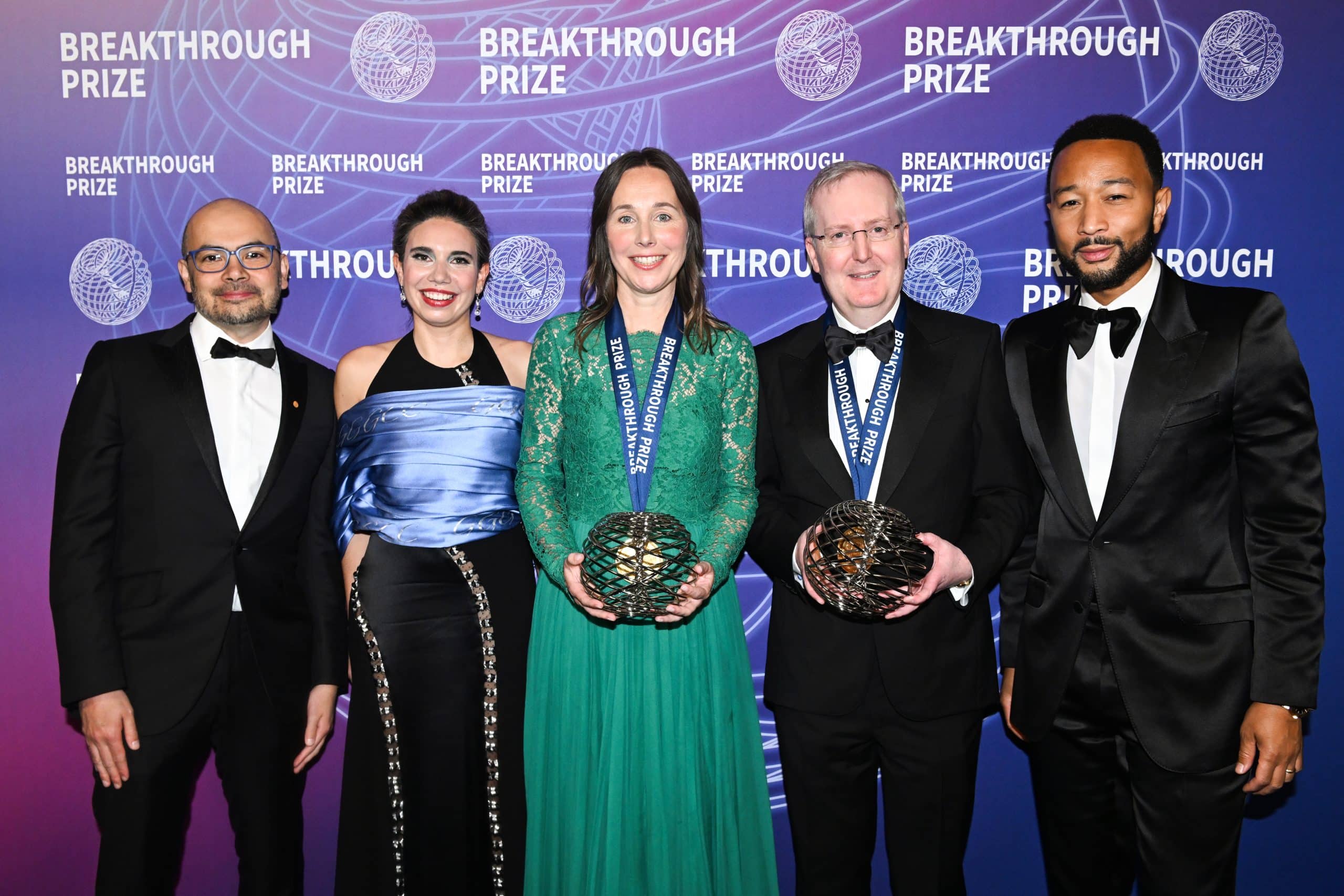 From left to right: Demis Hassabis, Yentli Soto Albrecht, Rosa Rademakers, Bryan Traynor, and John Legend at the 2026 Breakthrough Prize Ceremony